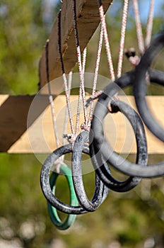 selective focus. detail of the rings of one of the obstacles of an obstacle race course, ocr photo