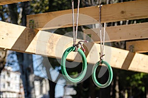 selective focus, detail of the rings of one of the obstacles of an obstacle race course, ocr photo