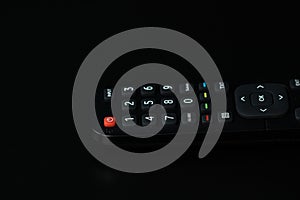 Selective focus, details of TV remote control buttons. Bucharest, Romania, 2021