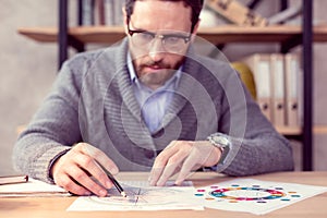 Selective focus of a drawing being made photo