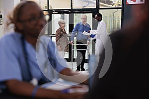 Selective focus on elderly couple having medical appointment with physician doctor