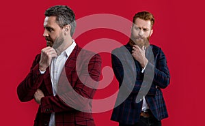 selective focus of elegant men wearing menswear. studio shot of two men in menswear jackets.