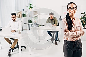 Selective focus of female office manager standing