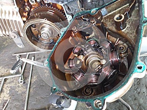 Selective focus of four-stroke scooter bike engine after dismantling