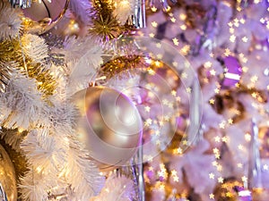 The selective focus on a grey color ball decoration on christmas