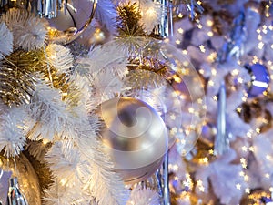 The selective focus on a grey color ball decoration on christmas