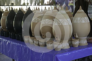 Selective focus of Handmade traditional Malay craft known as `labu sayong`.It is a hand made water storage container. Clay potte