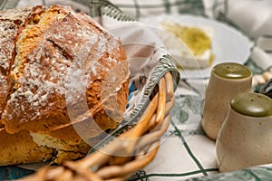 Selective focus of home baked crispy bread and feta cheese on the background