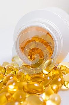 Selective focus image. Fish oil nutritional supplement capsules