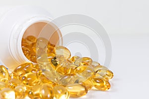 Selective focus image. Fish oil nutritional supplement capsules