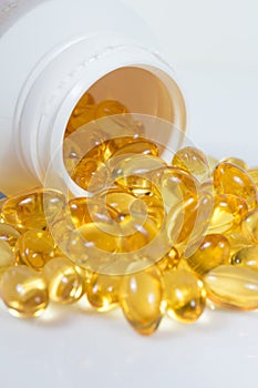 Selective focus image. Fish oil nutritional supplement capsules