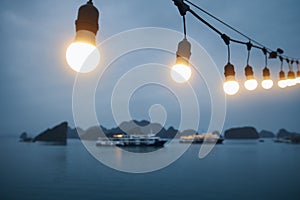 Selective focus on light bulb on deck of cruise ship