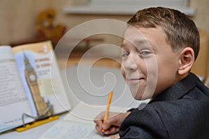 Selective focus of little boy learning how to write his name, Kid study at home, Children do homework at home, Concept for toddler