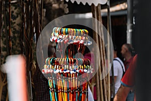 Selective focus on little wooden canes as a souvenir