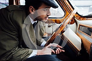 Selective focus of mafioso with gun