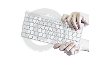 Selective focus man has thrash white keyboard and white photo