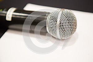 Selective focus of Microphone on stage floor background