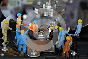Selective focus of miniature engineer and worker maintenance hard disk or fixed problem hard disk of Personal computer PC as
