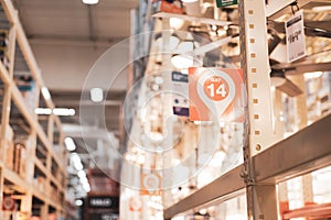 Selective focus modern lights and ceiling fans on display at hardware home improvement store in Dallas, Texas, bokeh background,