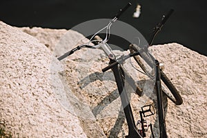 selective focus of mountain bicycles on rocky cliff