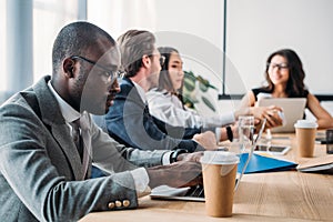 selective focus of multicultural business people having business meeting