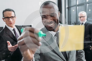 selective focus of multicultural businessmen having meeting