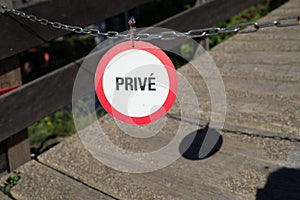 Selective focus of a no passage "prive" sign