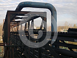 Selective focus of old rusty pipes and metals from an old factory