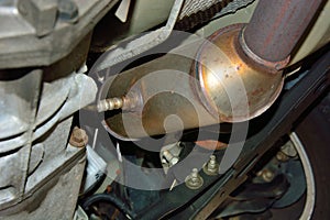 Catalytic Converted with O2 Sensor Under Automobile photo