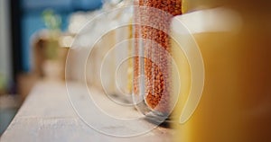 Selective focus of pasta and cereals in glass jars