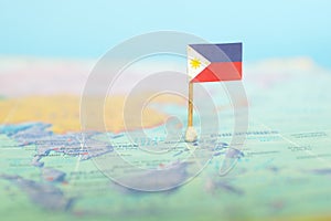 Selective focus of Philippine flag in world map. Philippines country location.