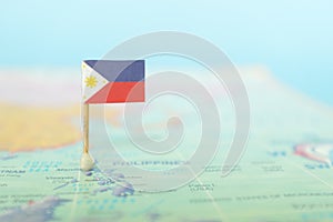 Selective focus of Philippine flag in world map. Philippines country location.