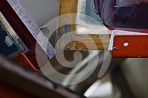 Selective focus photo of corners of frames for serigraphy production. printing images on t-shirts by silkscreen method in a design