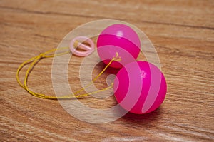 Selective focus photo of Lato-Lato, a traditional children`s toy which is currently going viral, especially in Indonesia.