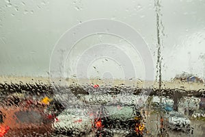 Selective focus photo of water droplets on car windscreen photo