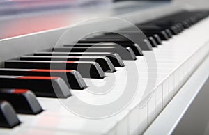 Selective focus of a piano keyboard closeup