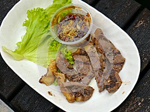 A selective focus picture of famous Malaysian adopt Thai recipe call daging harimau menangis in beef version.