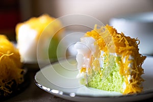 Selective focus piece of Gold Egg Yolk Thread Cake , or `Cake