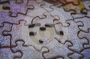 Selective focus of pieces puzzle, puzzle background.