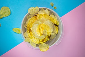 selective focus, potato chips on a colored background