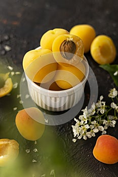 selective focus: ripe fresh apricots in a clay bowl