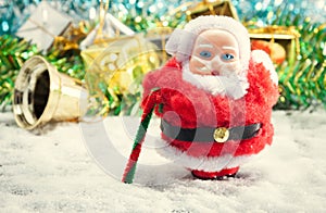 selective focus santa doll on snowflake and blur Christmas decor