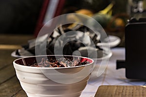 Selective focus shot of chapulines in a bowl with a blurred background