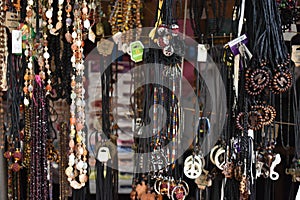 Selective focus shot of handmade accessories on a street market in Trincomalee, Sri Lanka
