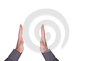Selective focus shot of human hands holding nothing in a white background