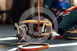 Selective focus shot of the ice climbing crampons