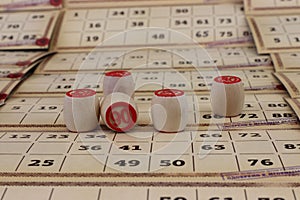 Selective focus shot of the lottery game papers and stampers