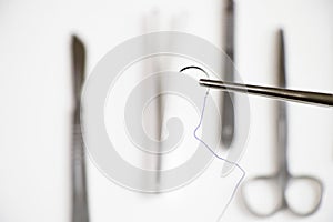 Selective focus shot of a surgical suture