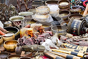 Selective focus. Some souvenirs on the street market stall near Bodnath stupa, Kathmandu, Nepal