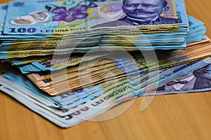 Selective focus on stack of LEI romanian money. Lei banknotes isolated